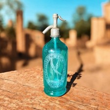 Siphon. Seltz. Sifon. Bleu turquoise torsadé. Graphisme CIGOGNE. MAROC.