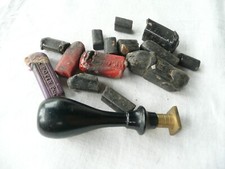 GE marked wood stamp with multiple pieces of wax to seal