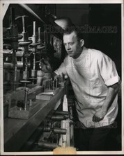1949 Press Photo Technician Kenneth Adams Inspects Ting Lenses