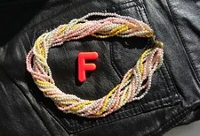 COLLIER VINTAGE NEUF RANGS