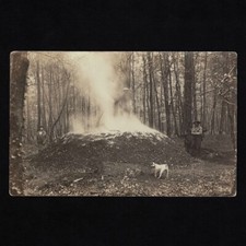 Old postcard photo card / coal maker / stove of a coal maker in the forest