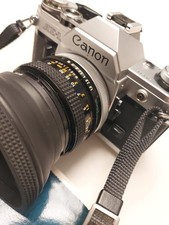 Canon AE-1  Silver+ 50mm f/1.8 FD + Pile + Filtre Et Pare Soleil, Flash Offer!! 