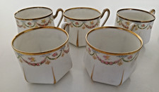 Pretty suite of 5 cups in de Limoges bow decor and flower garlands