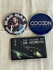 VTG Movie Promo Pinback Buttons Mad Max Cocoon Dr Moreau V6023