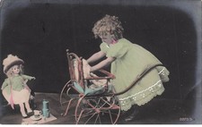 CHILD with pram, stroller and DOLL