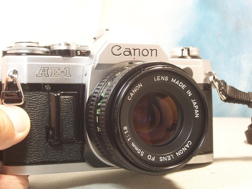 Canon avec objectif - ,