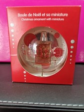Miniature de parfum dans une boule de Noël de Jean-Paul GAULTIER - MADAME
