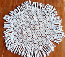 Crocheted cotton fringed tablecloth on the edge. diameter 70 cm