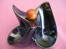 ashtray - ceramic pipe holder with padding.