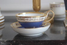 Tasse et sa soucoupe en porcelaine de Paris – XIXe siècle, fond bleu et or