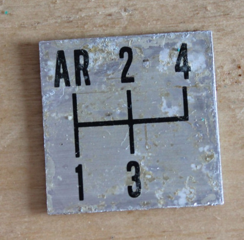 Plaque vitesses sur console - de,