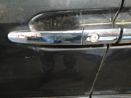 Poignee porte avant gauche