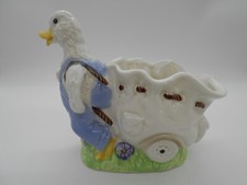 VIDE POCHE CANARD TIRANT UN