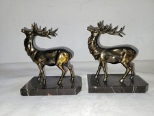 Paire de serre livre : Cerfs sur socle en marbre