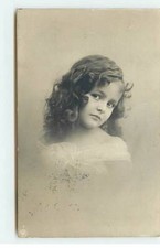 Child - girl with bent head