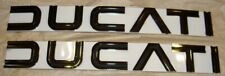 1974-1979 Ducati 860GT NOS pair gas fuel tank side cover emblem badges white