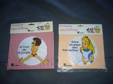 Lot 2 livres en tissu disney