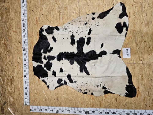 Peau vache avec petits - de,