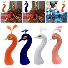 Tête de mannequin paon