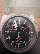  Lot de 2 SWATCH IRONY neuves en boite dont une CHRONO. Piles à changer.