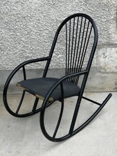 Rocking chair design 80's tubulaire Memphis?