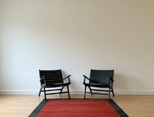 Fauteuils design cuir noir numérotés – Olivier De Schrijver, série limitée