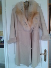 Manteau mouton retourné et