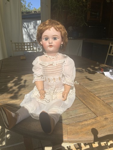 Poupée porcelaine - h.,