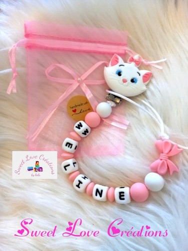 Attache tetine - 😻,