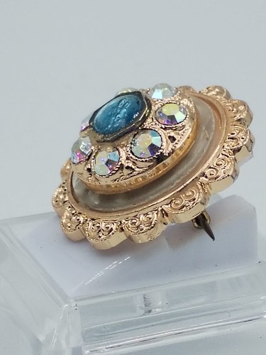 Broche vintage dorée strass