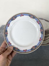 Plat Et 12 Assiettes à gâteau en porcelaine de Limoges guirlande fleurie