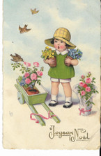Old postcard MERRY CHRISTMAS LITTLE GIRL PUTTING FLOWERS IN A WOODEN WHEELBARROW