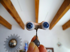 Yeux bleus poupée anciens
