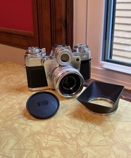 Zeiss Ikon Contarex Bullseye Film Camera with Distagon f4 35mm Lens + Cap & Hood