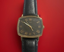 Timex Gold Tonneau Tank Roman Numeral Black Dial Leather Watch
