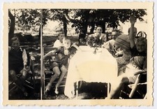 Family Portrait at Garden Table - Old Photo Year. 1940