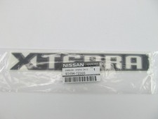 NEW GENUINE Dark Gray Liftgate Emblem For 2000-2001 Nissan Xterra 93494-7Z005