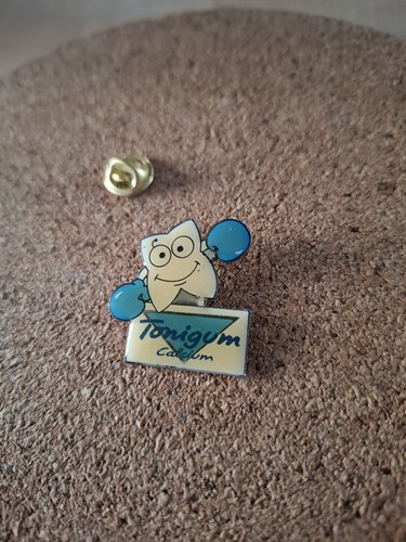 Pin tonigum calcium - pin’s, dent