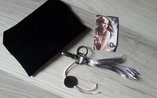 Porte clés  GUERLAIN INSOLENCE collector avec son sac velours 