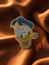 Pin's publicitaire rétro