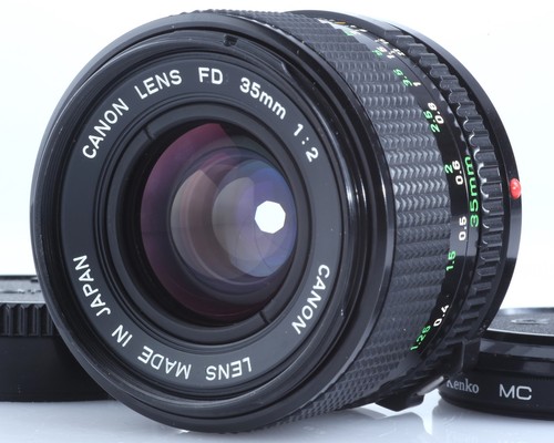 Comme neuf objectif canon - neuf],