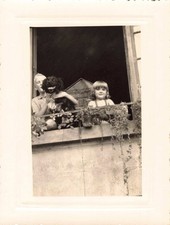 OLD PHOTOGRAPH GIRL AT THE WINDOW WITH HER DOG