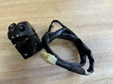 UN COMMODO COMMANDE GAUCHE