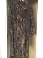 Manteau fourrure astrakan