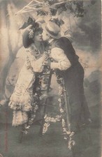 CPA Fantasy - Young couple on a stepper kissing under the mistletoe 