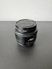 Objectif NIKON NIKKOR Series 50mm 1:1.8 Ai-s pancake avec bouchons