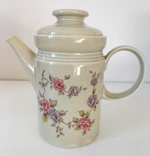 Théière florale beige et