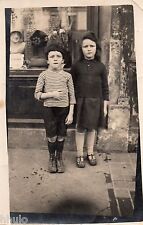 BM057 Vintage Photo Card RPPC Child in Front of Store Trade Shop
