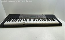 'Casio LK-165 Keyboard Powers On'