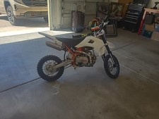 Kayo 125cc Dirtbike It Is Beat Up Alot But I Worksand The Handle Bars Are Bent.
